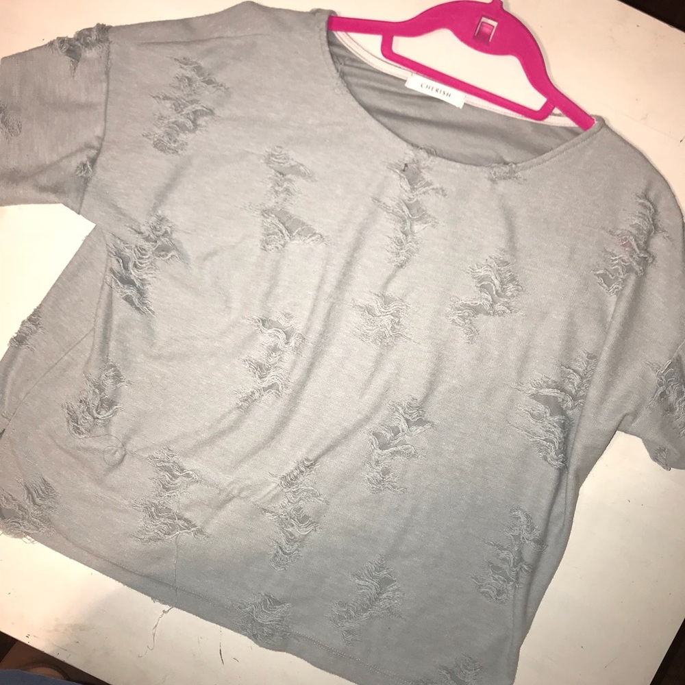 light blue distressed shirt